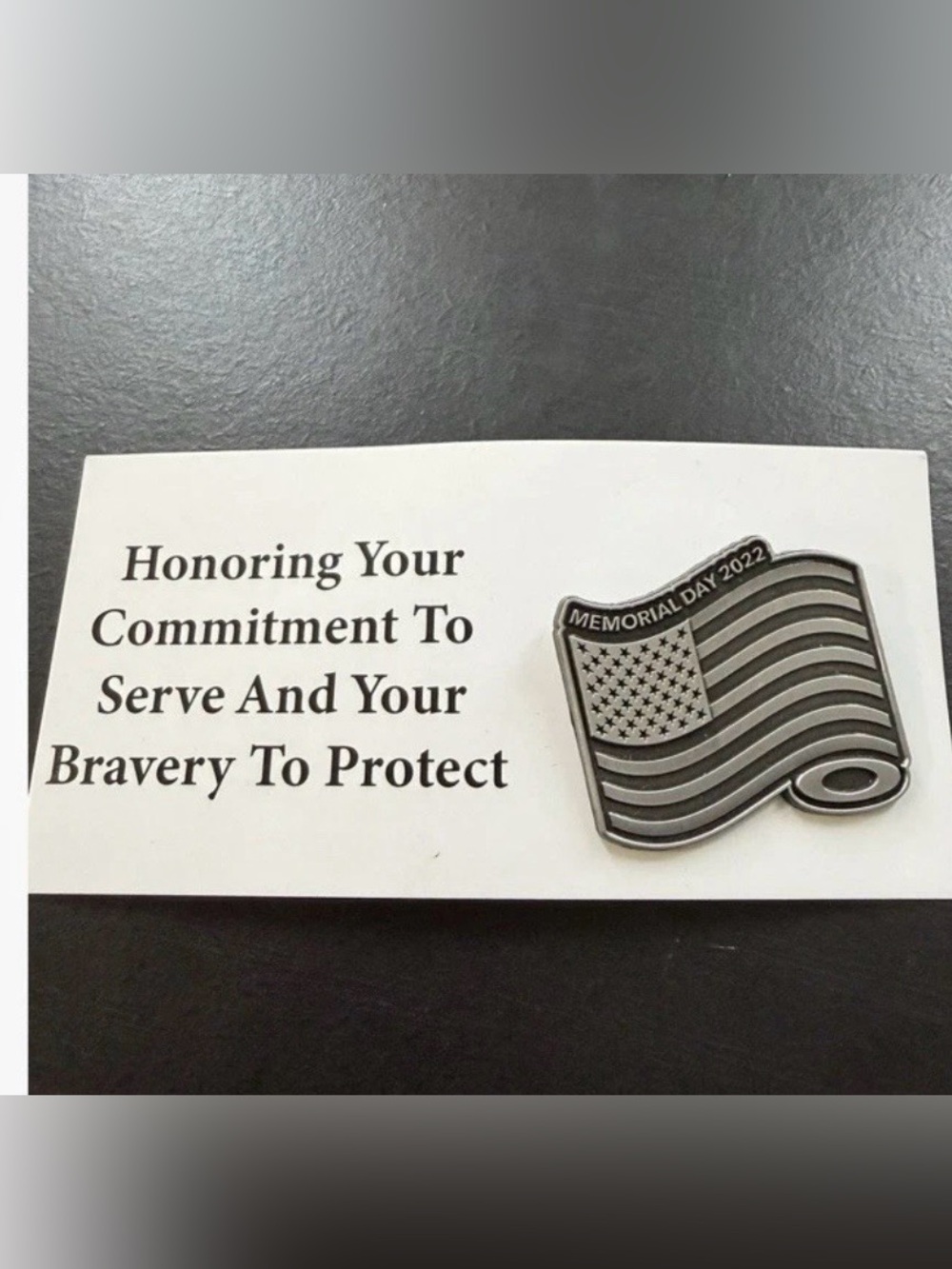 Oakley Silver American Flag Memorial Day 2022 Pin